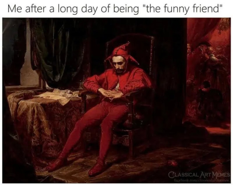 A man in red costume sitting on a throne with a caption about being 'the funny friend'.