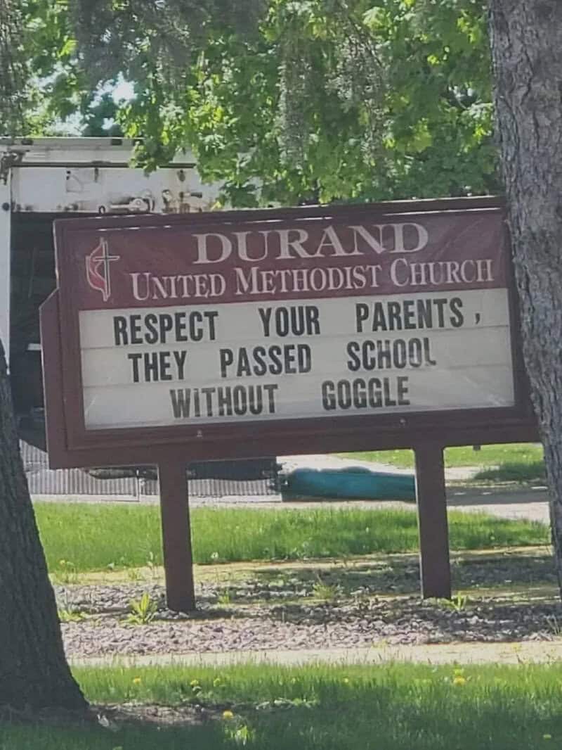 Sign at Durand United Methodist Church with humorous message about school and Google.