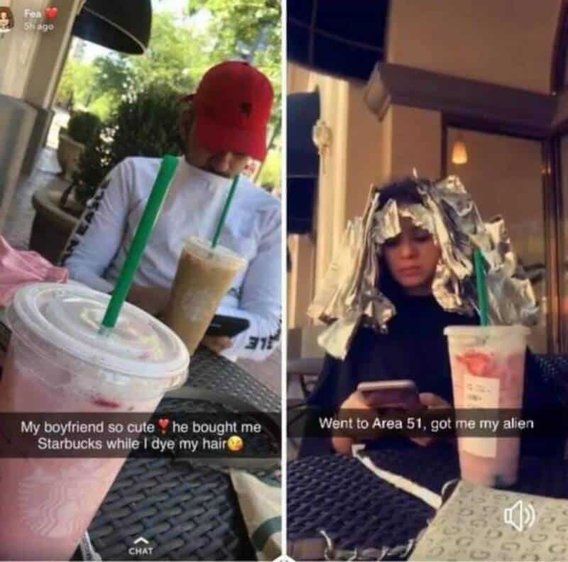 Two women with drinks, one with a red cap and the other with aluminum foil on her head.
