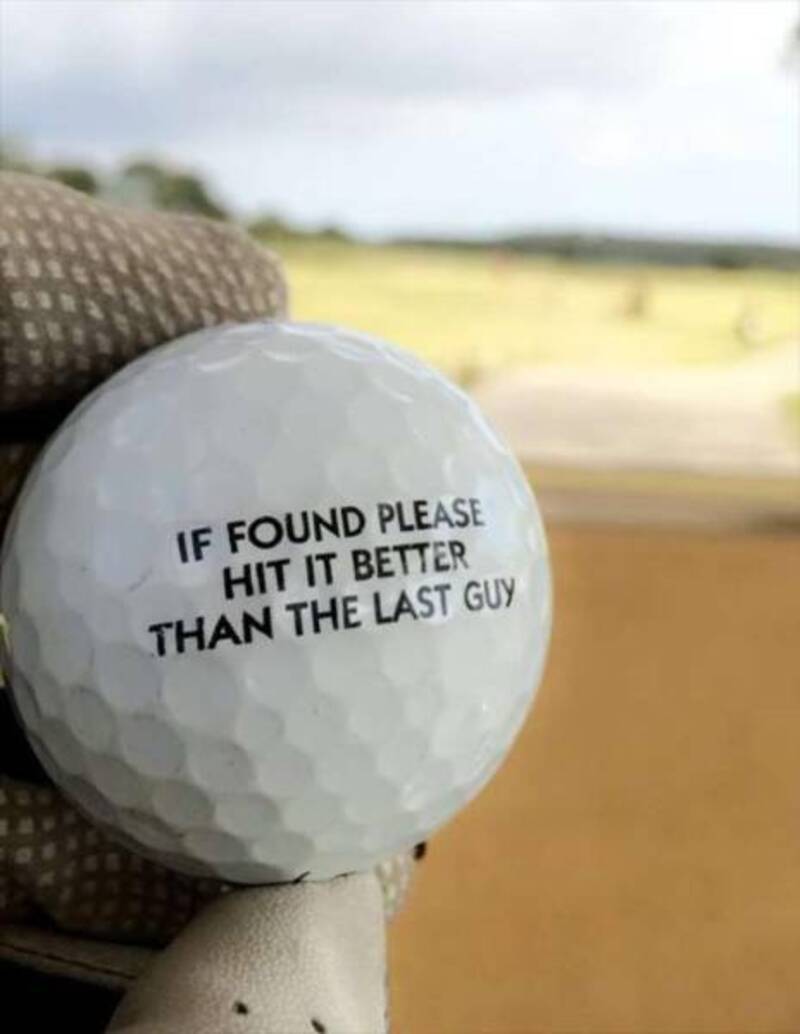 Golf ball with humorous message: 'If found please hit it better than the last guy'.