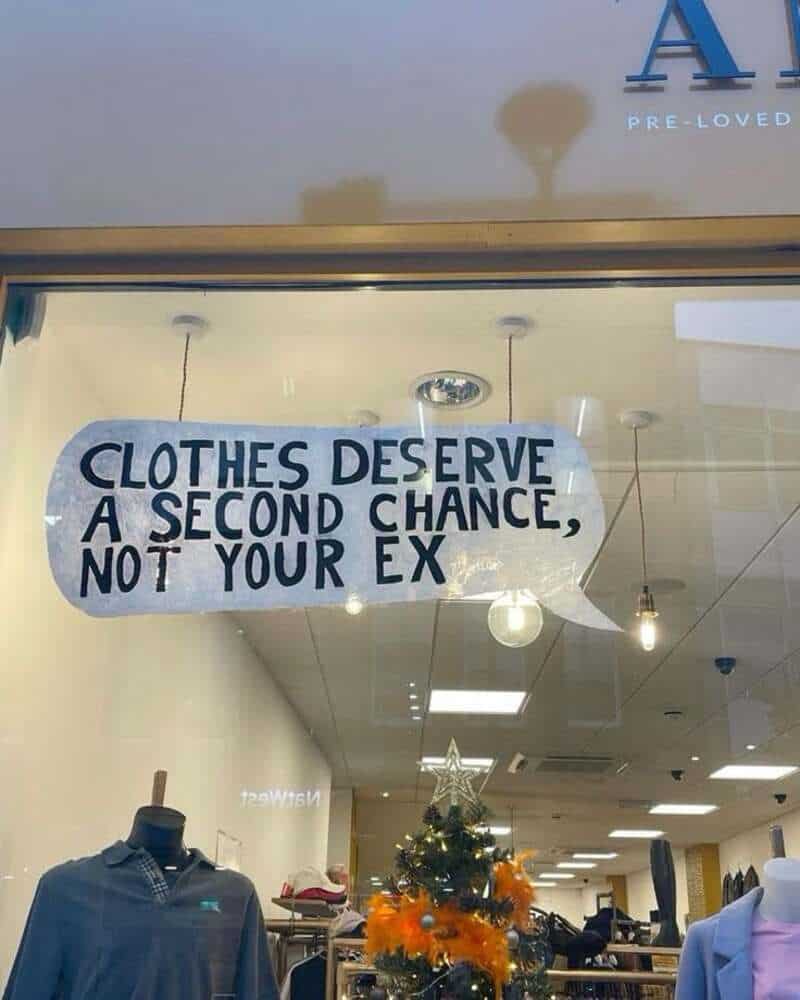 Sign in a store says 'Clothes deserve a second chance, not your ex'.