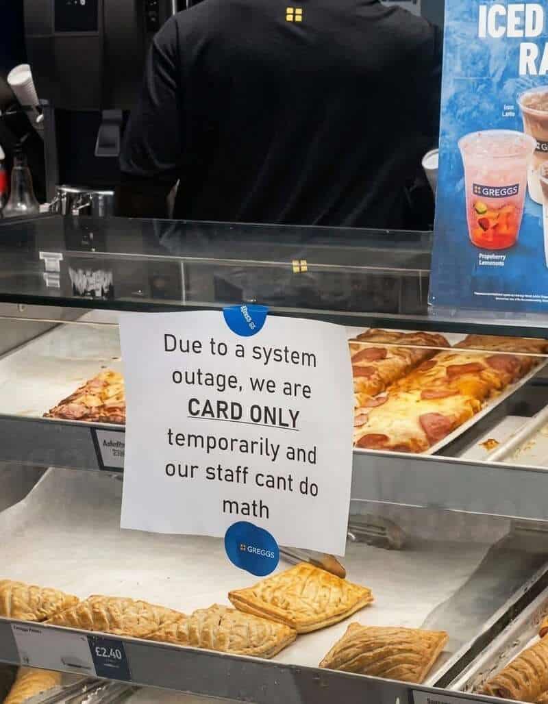 Sign says due to system outage, we are card only, temporarily and our staff can't do math.