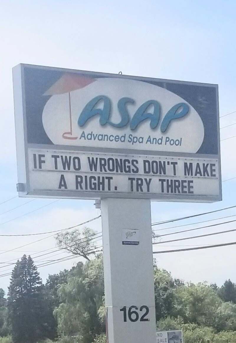 Sign for ASAP Advanced Spa and Pool with humorous quote about mistakes.