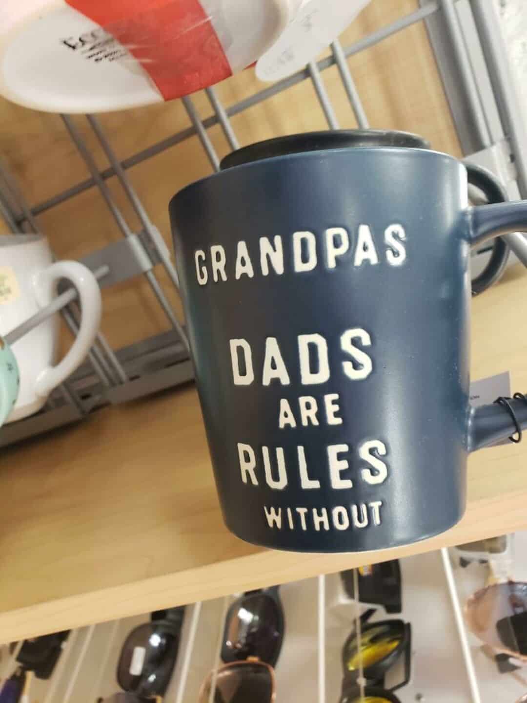Coffee mug with the text 'Grandpas Dads Are Rules Without' on it.