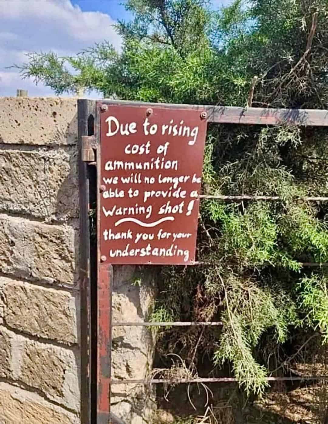 Sign about ammunition shortage due to rising costs, thanking for understanding.