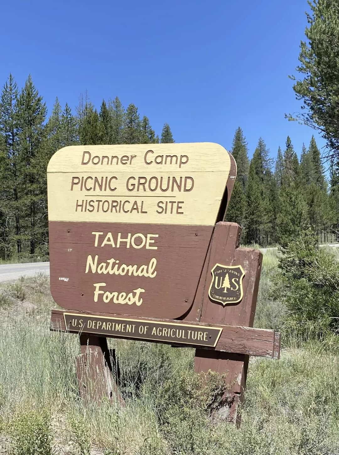 Donner Camp Picnic Ground Historical Site sign in Tahoe National Forest.