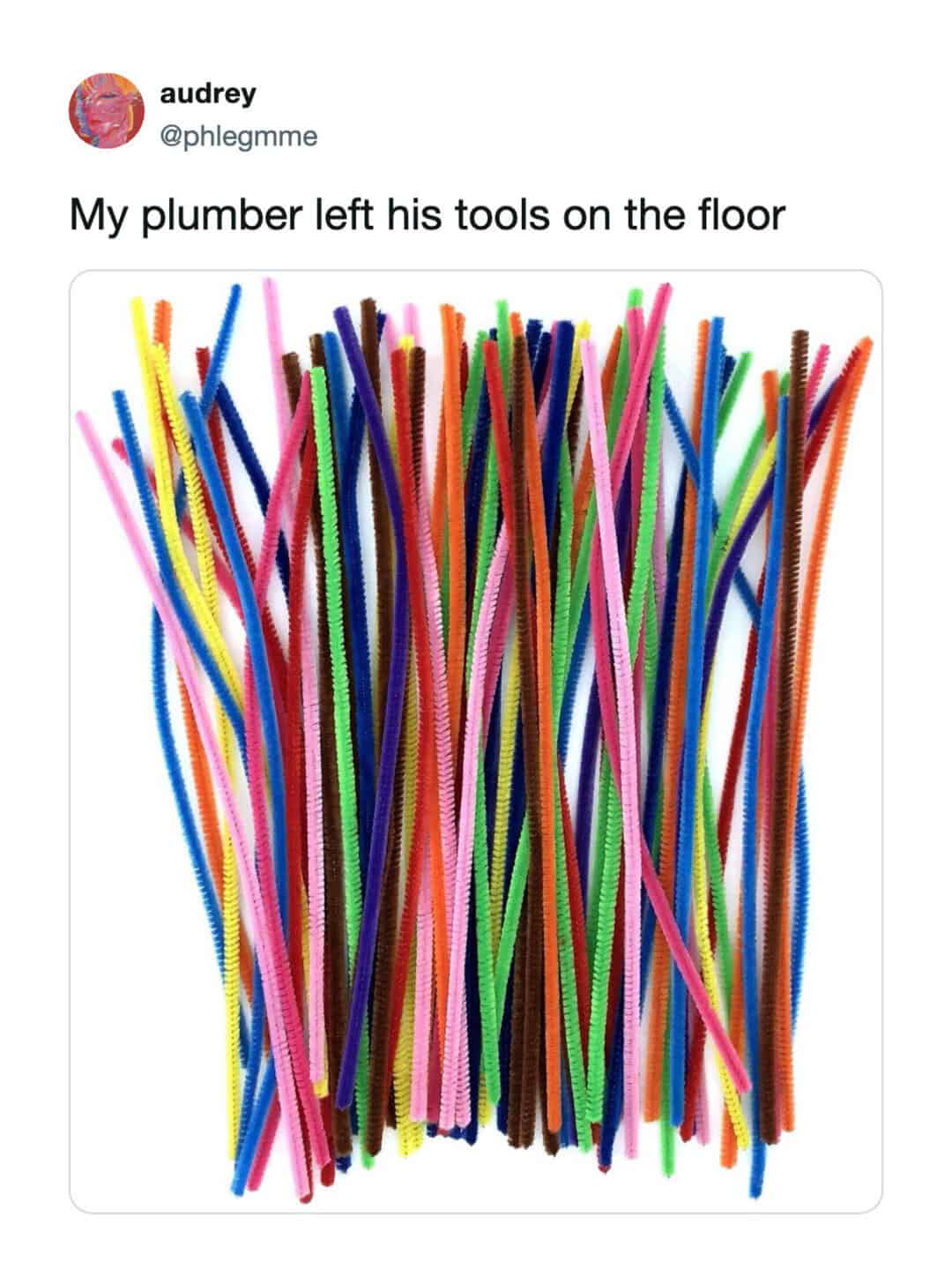 Colorful plastic straws scattered on the floor with caption about a plumber's tools.