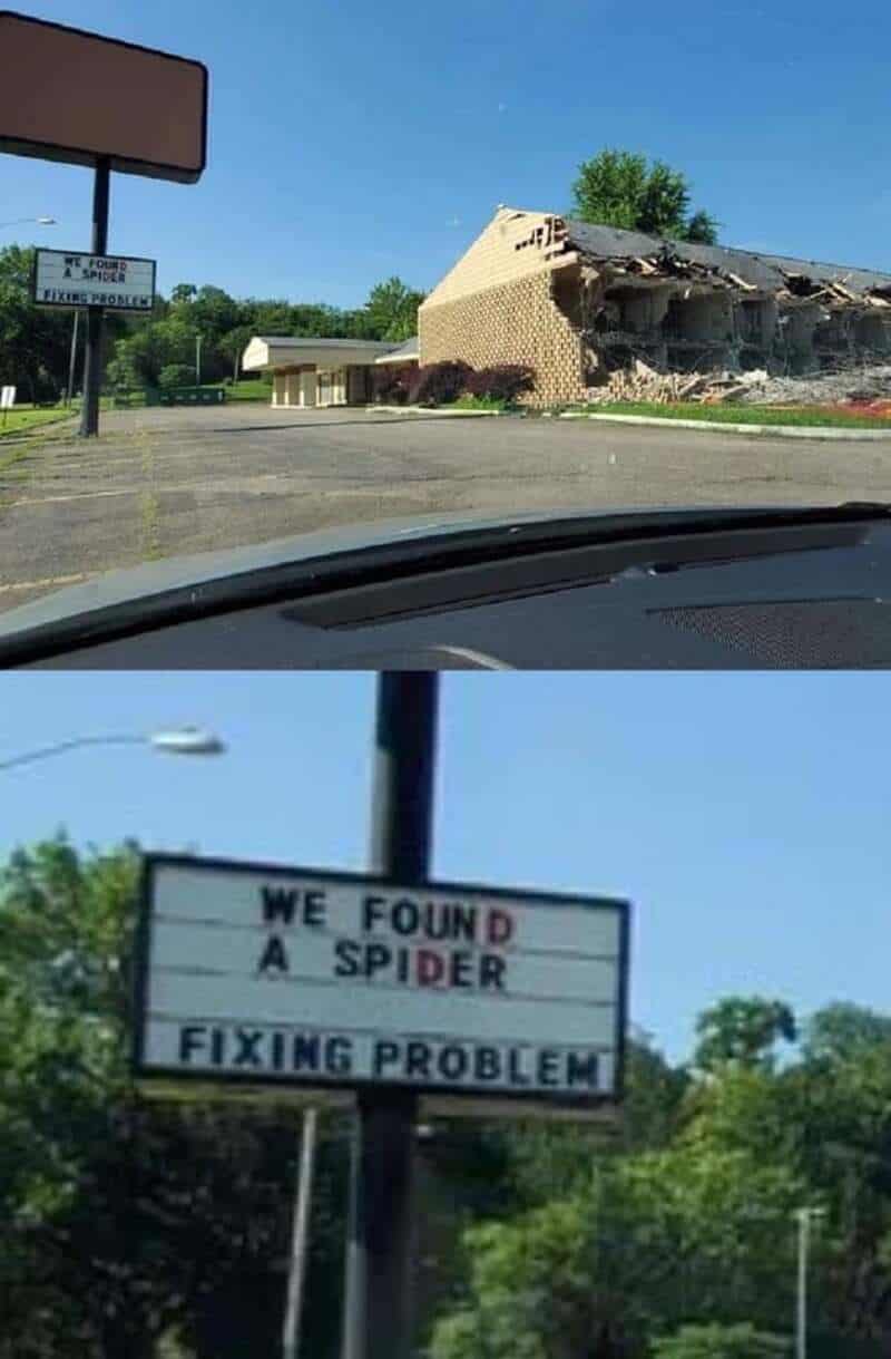 Damaged building and a sign that says 'We found a spider fixing problem'.