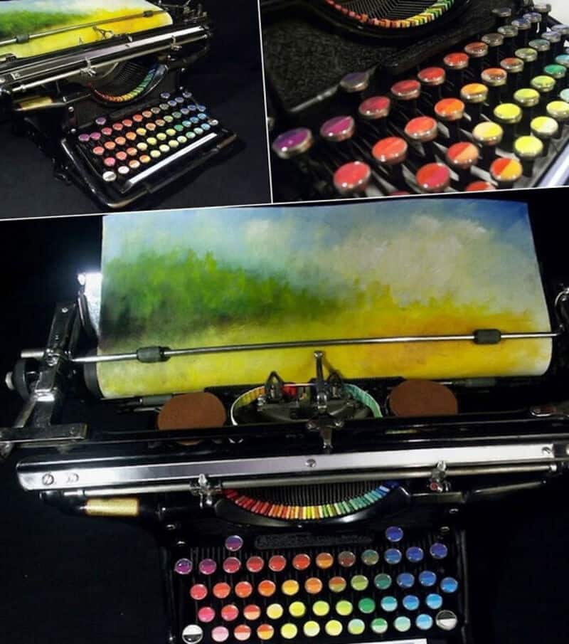 Colorful watercolor painting on a mechanical art device with multiple color palettes.