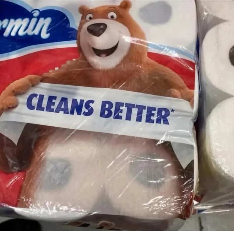 Bear character holding a sign that says 'CLEANS BETTER' on packaging.