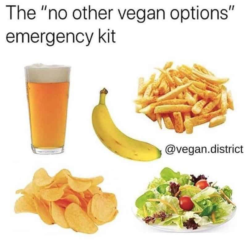 Vegan emergency kit with beer, banana, fries, chips, and salad.