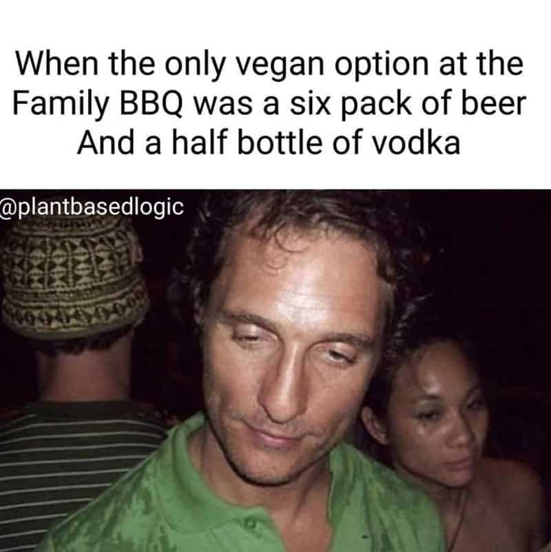 Man at family BBQ with six-pack of beer and half bottle of vodka, text overlay about vegan options.