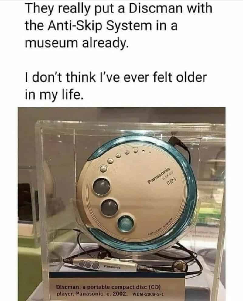 Discman with anti-skip system in a museum, nostalgic for old tech.