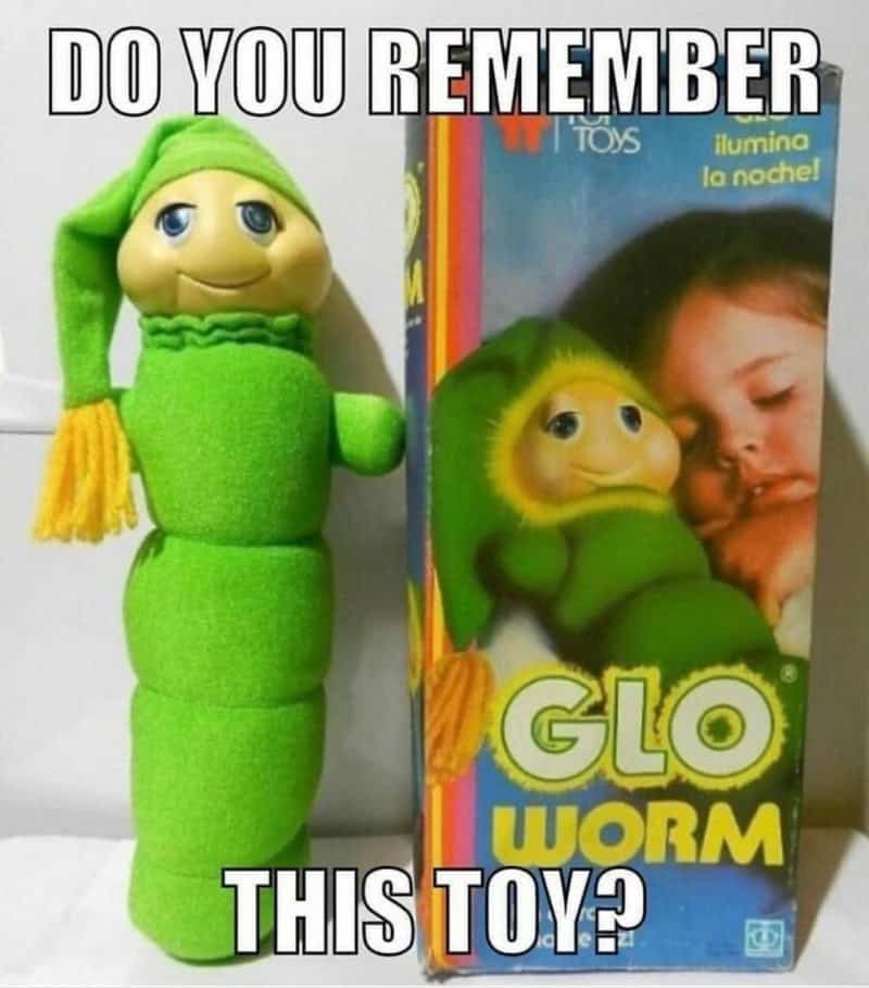 Do you remember this toy? Glo Worm plush toy with a girl sleeping in the background.