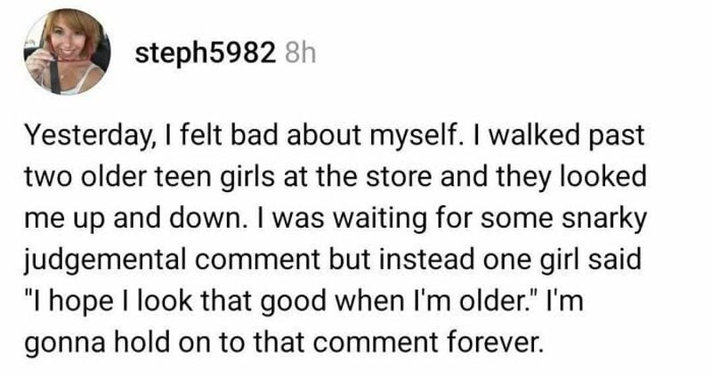 Teen girl walking past two older girls at the store, feeling hurt by their look.