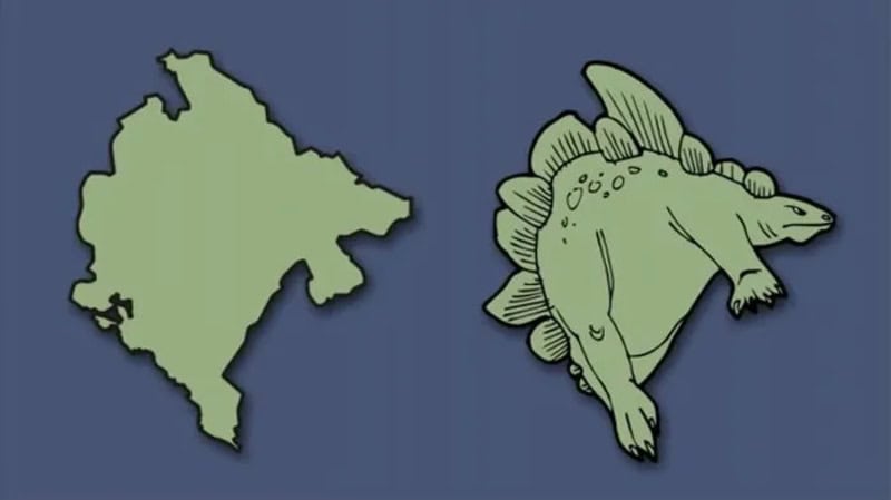 Map of a country and a creature resembling a dinosaur or dragon.