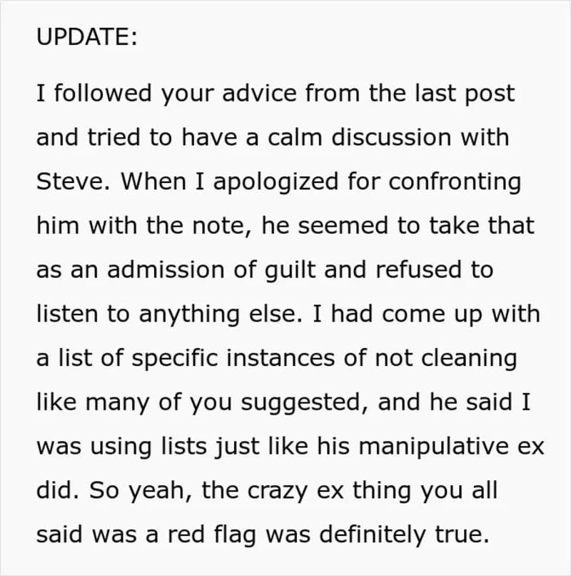 Close-up of a handwritten note with a red flag symbol at the top.