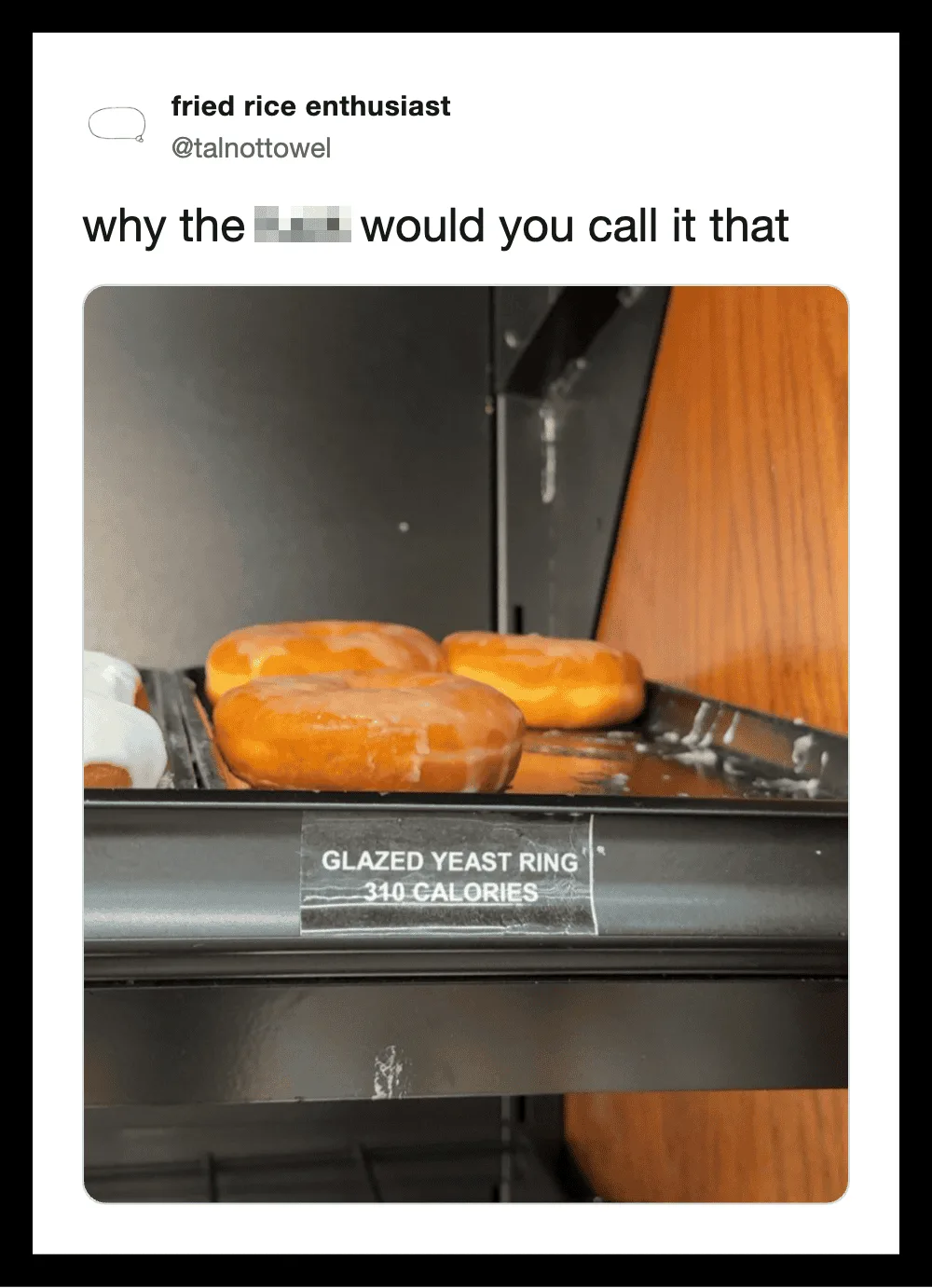 Fried donuts on a display with a sign reading 'Glazed Yeast Ring 310 Calories'.