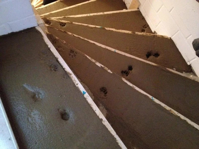 Uneven concrete stairs with gaps and missing sections, part of a home improvement fail.