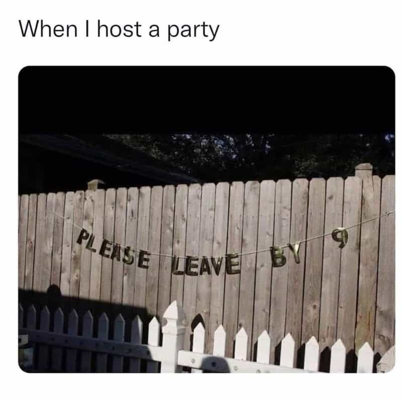 Wooden fence with "Please Leave By 9" banner for funny party meme.