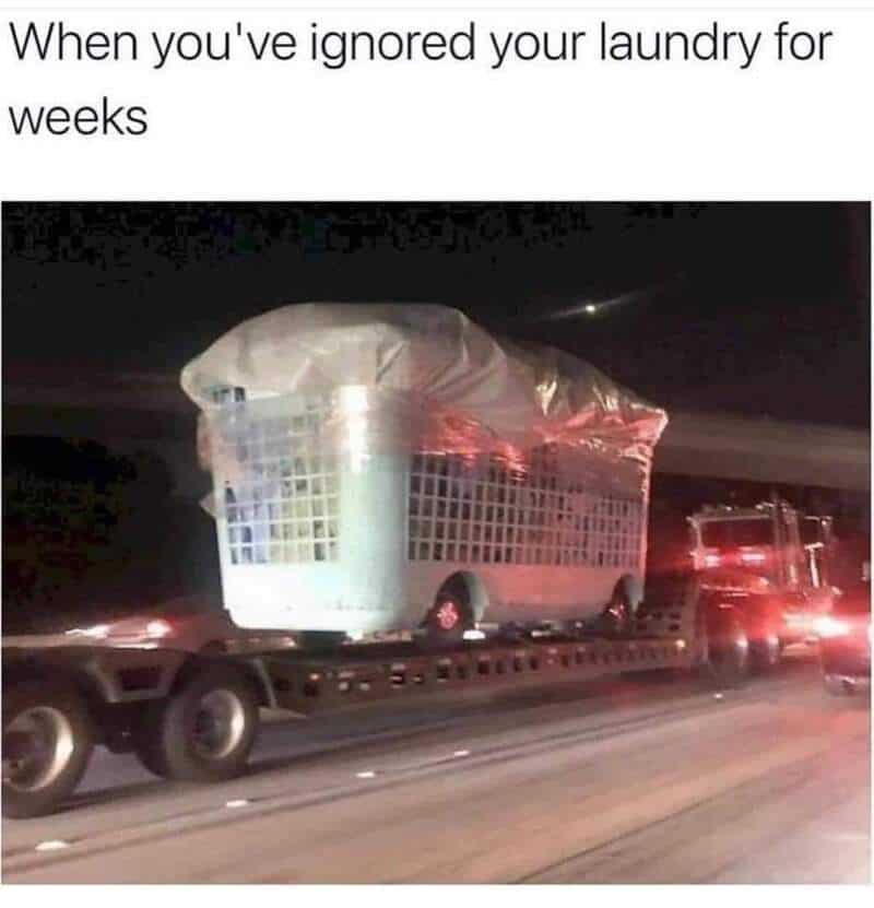 Laundry pile, laundry basket, laundry ignored, humorous meme, relatable laundry joke.