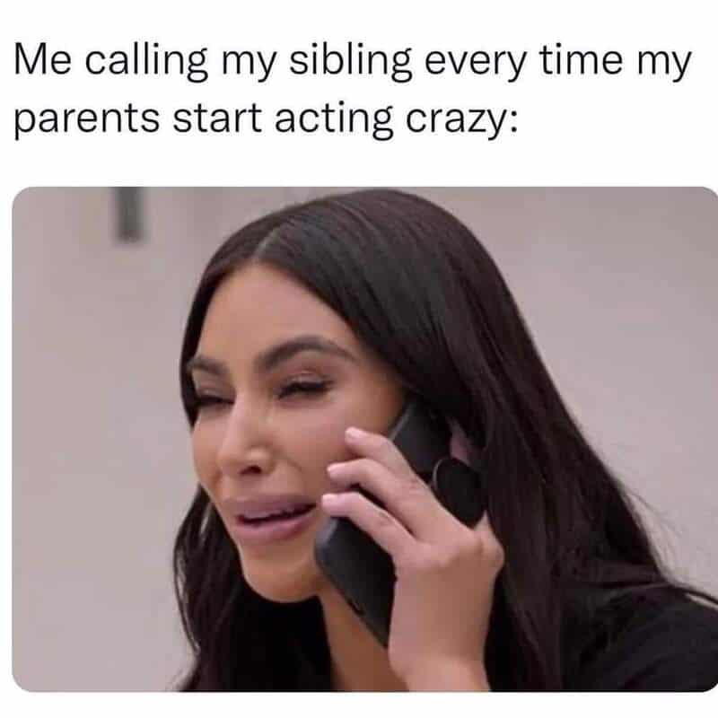 Woman on phone, frustrated, talking about parents acting crazy.