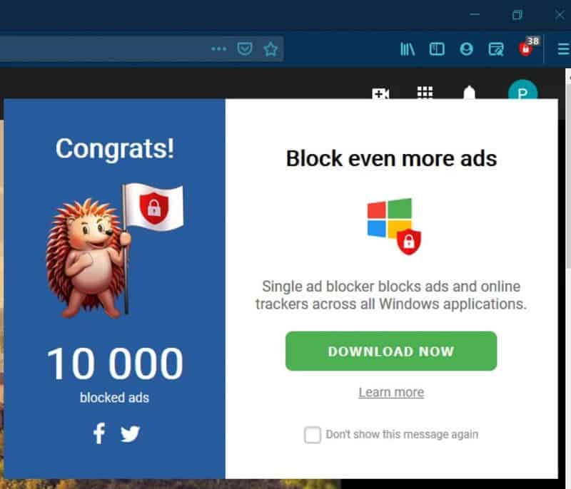 Ad blocker notification with a hedgehog mascot and Windows logo.