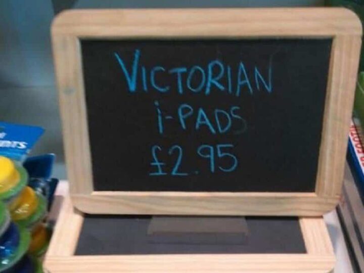 Victorian i-Pads £2.95 written on a small blackboard in a store.