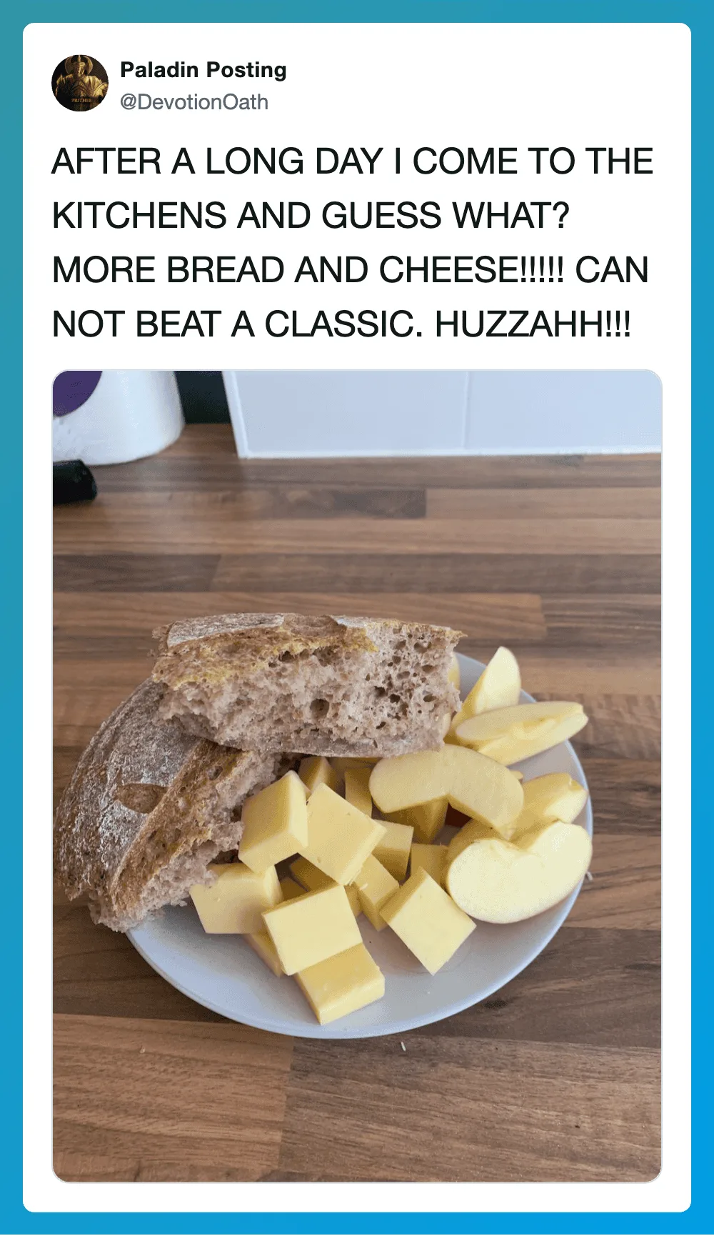 A plate of bread, cheese, and apple slices with a kitchen background.