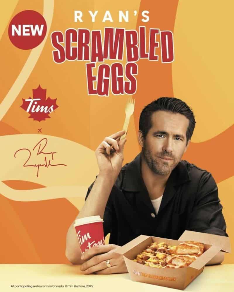 Ryan's Scrambled Eggs ad with a man holding a fork and a pizza box.