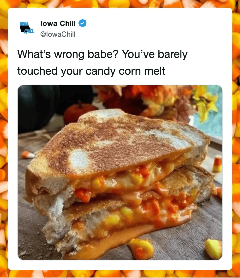 Close-up of a grilled cheese sandwich with melted candy corn spilling out.