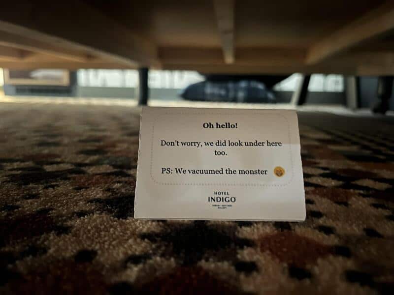 Note under table says 'Oh hello! Don't worry, we did look under here too. PS: We vacuumed themonster.