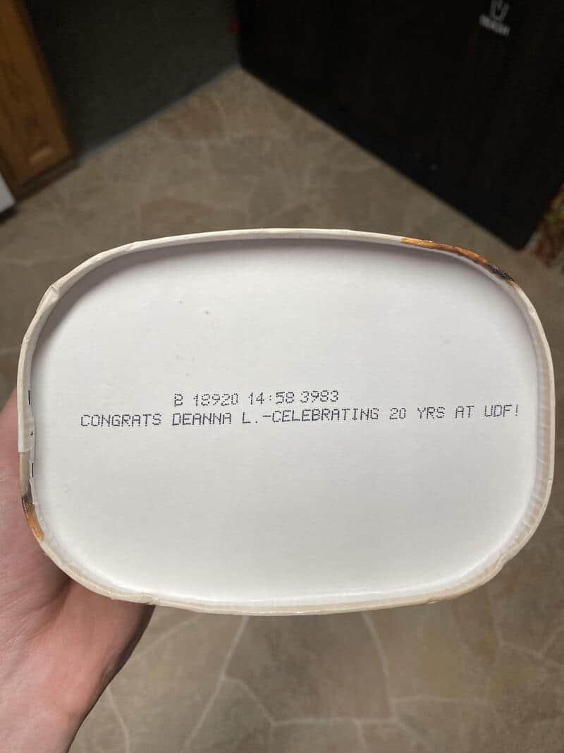 Ice cream container with text celebrating 20 years at UDF.