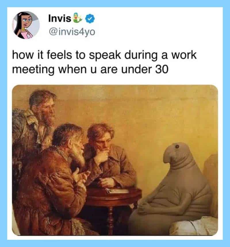 Humorous meme showing a person in a seal costume during a work meeting.