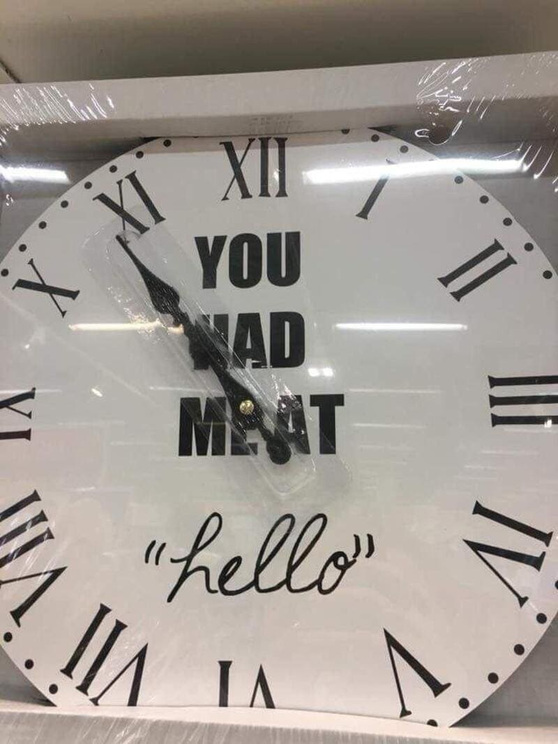 Clock with Roman numerals and text: 'YOU HAD ME AT "hello"'.