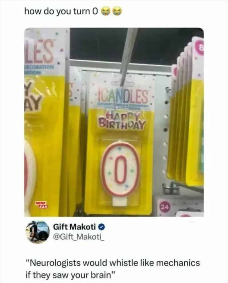 Zero birthday candle on a store shelf with colorful packaging.