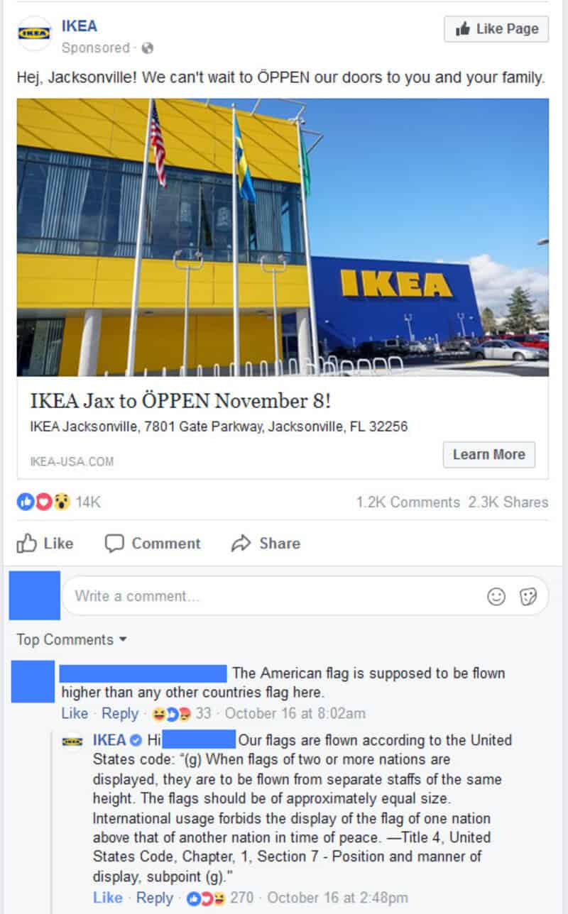 IKEA store with American and Swedish flags outside, blue sky, and parking lot.