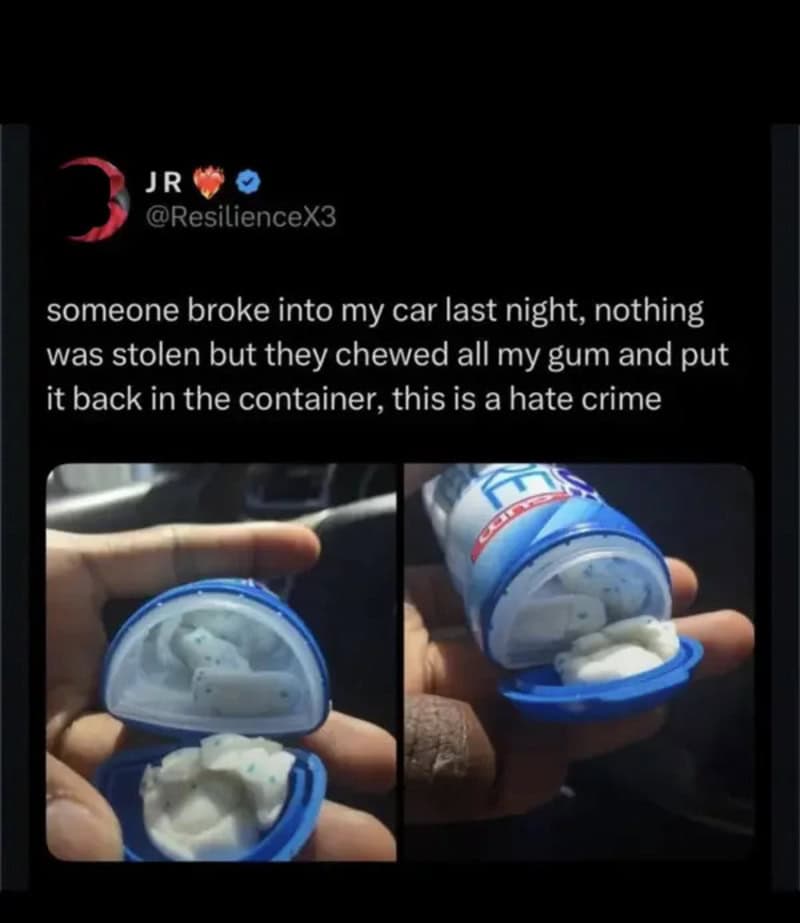 Person's hand holding a container of chewing gum with chewed gum inside.