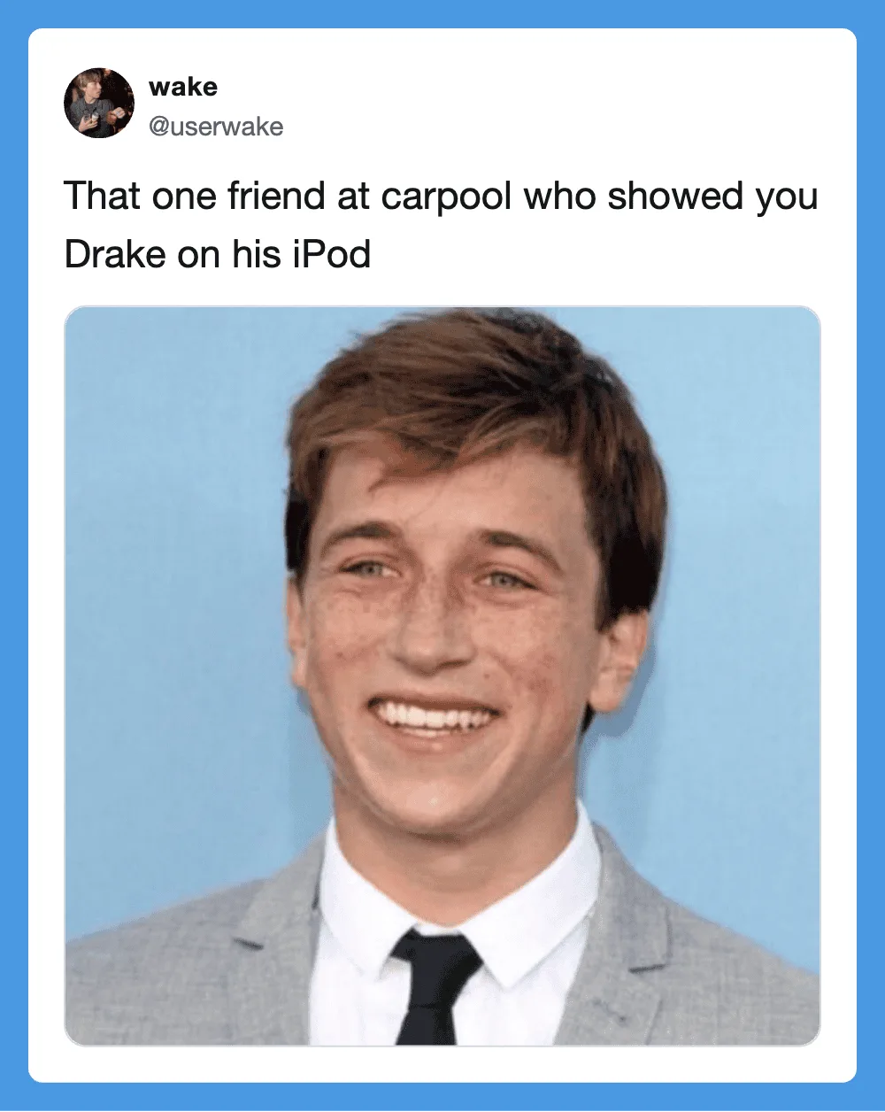 Friend at carpool showing Drake on his iPod, smiling.